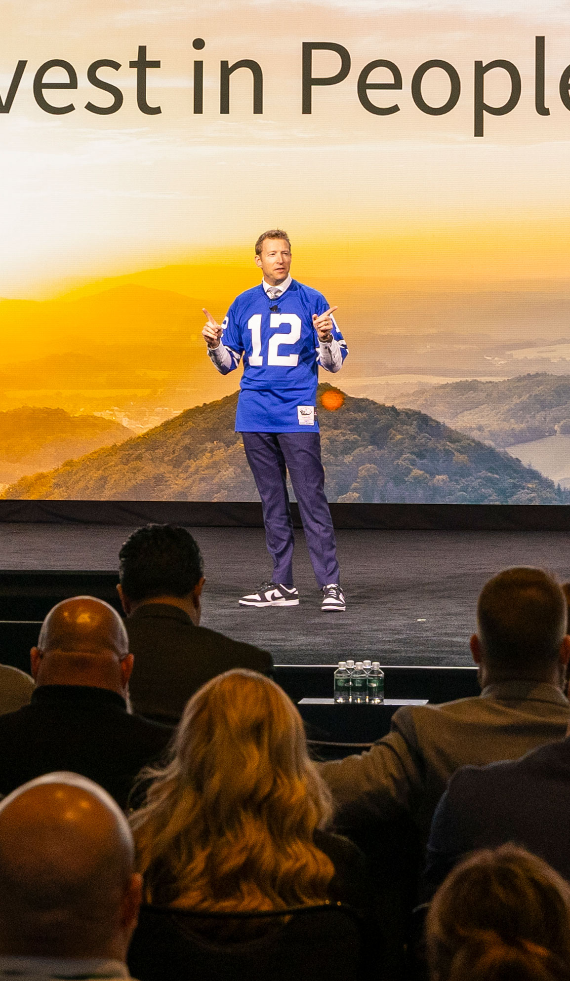 Attendees networking at a leadership conference event