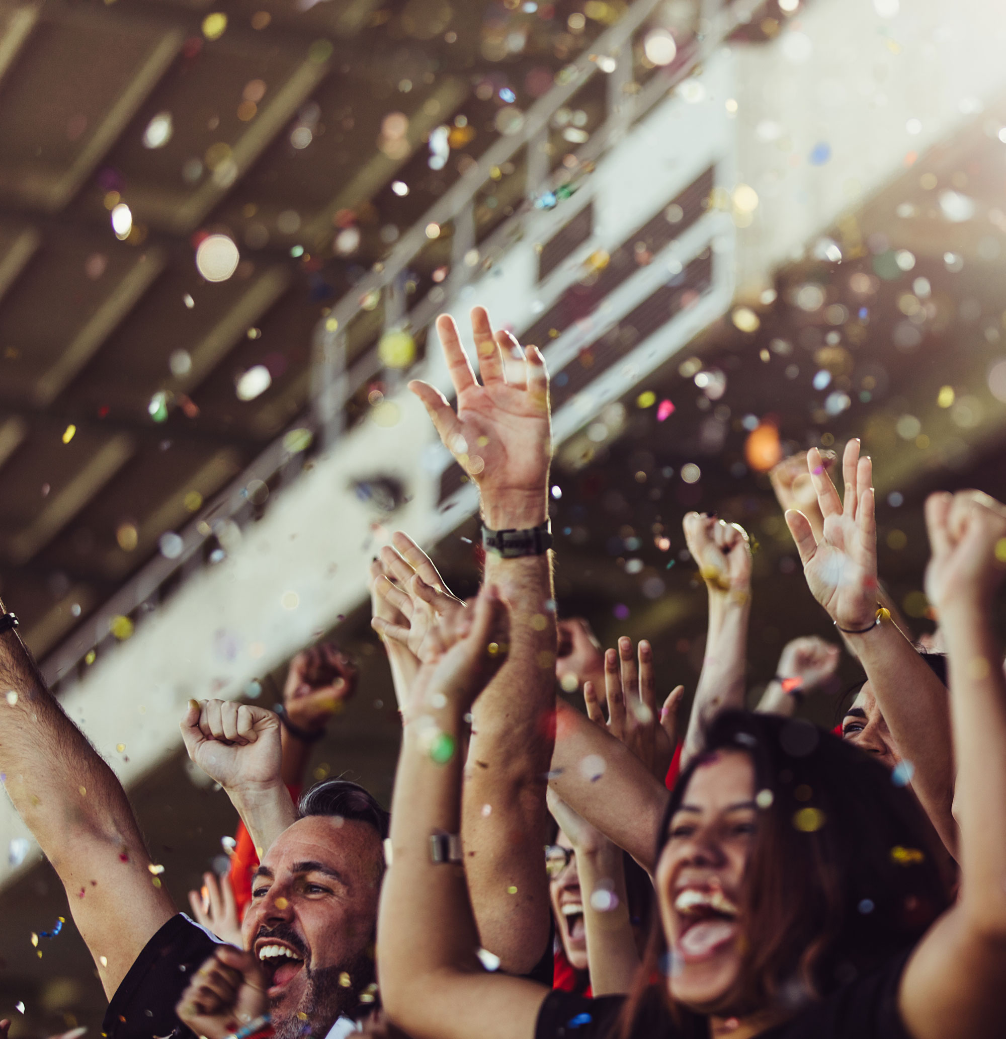 Corporate awards ceremony with team members celebrating on stage